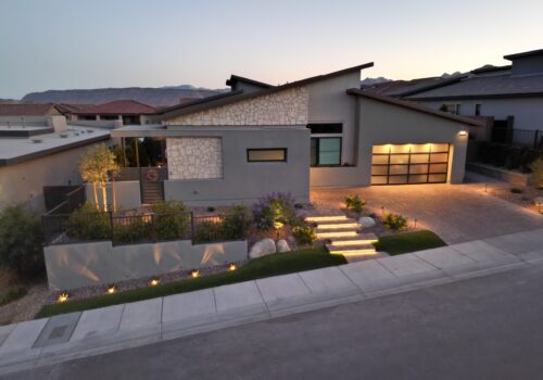 A house with lights on the front of it